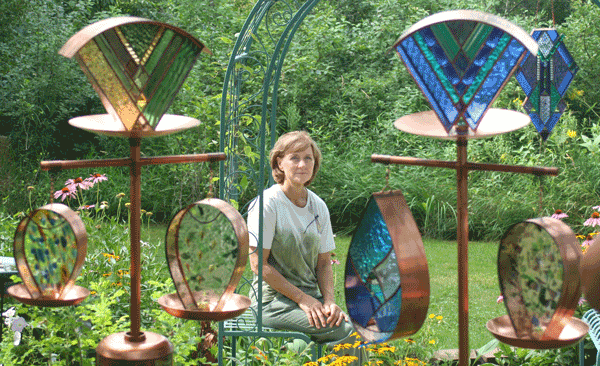 Artist Julie Kelly working in her studio